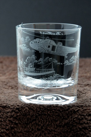 Glass tumbler, hand engraved with helicopter and boat.  Commission by Fire and Rescue.