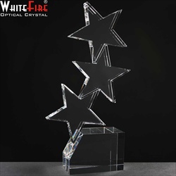 Three crystal Stars mounted on block of crystal. Star Award.