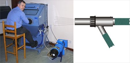 The seated operator has a large window to view his work while seated at the sandblasting machine. Professional sandblast machine for glass engraving.